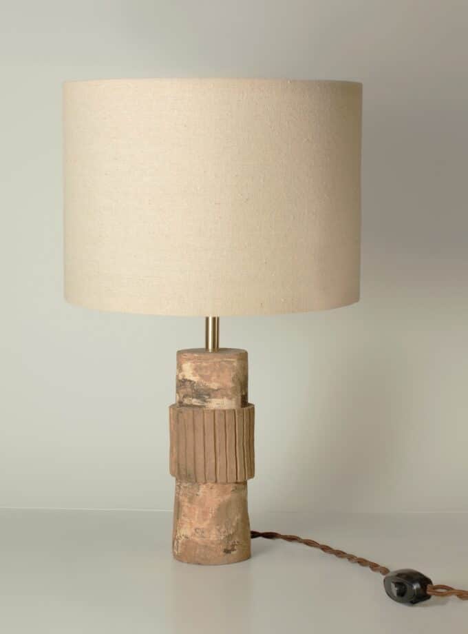 Table lamp with beige lampshade