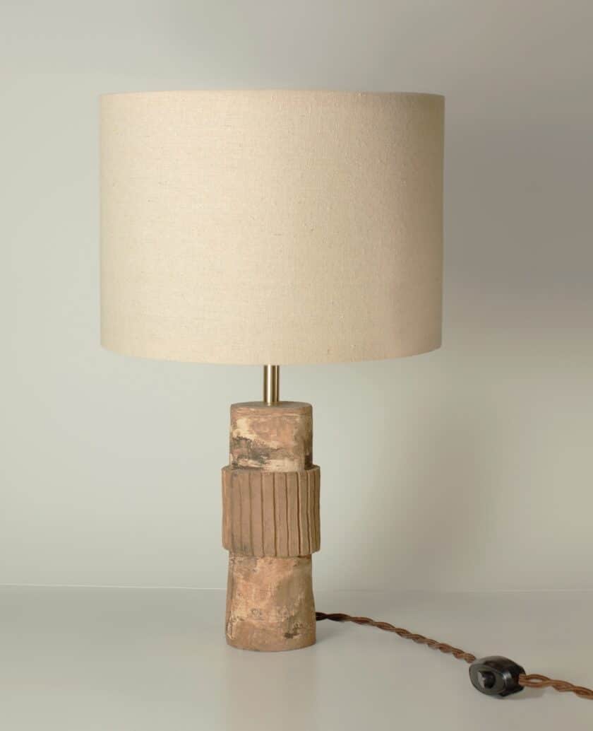 Table lamp with beige lampshade